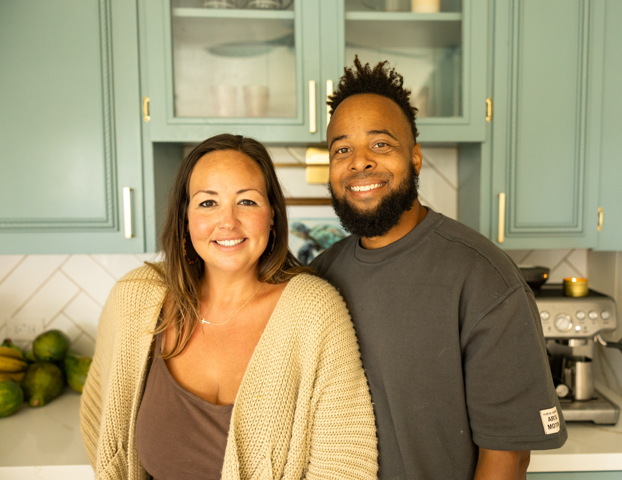 Darin and Monica standing in a kitchen